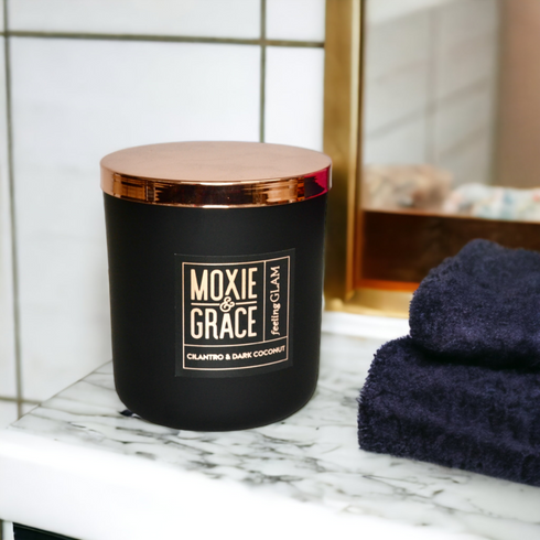 Coconut Milk & Honey 12oz Candle in Black by Moxie & Grace — a soft, creamy blend of coconut milk, honey, vanilla, and warm musk
