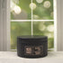 Himalayan Bamboo 5oz Candle in Black by Moxie & Grace — a serene, spa-inspired blend of bamboo, verdant florals, lemon, and pine