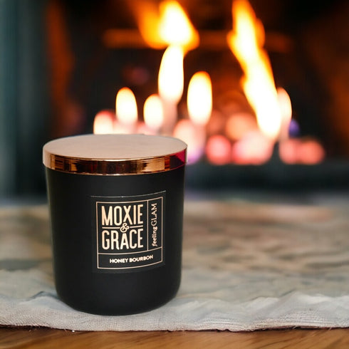 Honey Bourbon 12oz Candle in Black by Moxie & Grace — a rich, warming blend of honey, bourbon, vanilla, amber, and oak