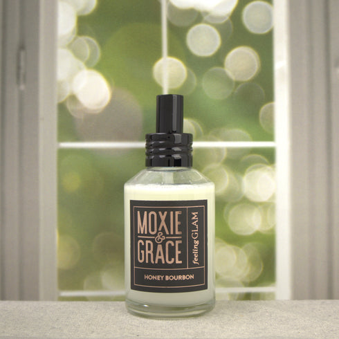 Honey Bourbon Room Spray 4oz bottle by Moxie & Grace — warm honey, orange marmalade, bourbon, and brown sugar fragrance, non-toxic and USA-made