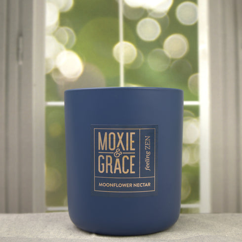 Moonflower Nectar 12oz Candle in Navy by Moxie & Grace — an enchanting blend of pear, agave, marine florals, dark musk, and amber