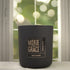 Nag Champa 12oz Candle in Black by Moxie & Grace — a meditative blend of sandalwood, patchouli, amber, rose, and dark musk