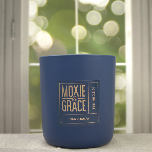 Nag Champa 12oz Candle in Navy by Moxie & Grace — a meditative blend of sandalwood, patchouli, amber, rose, and dark musk