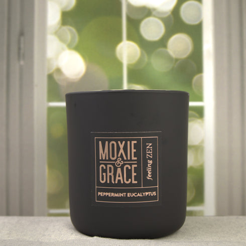 Peppermint Eucalyptus 12oz Candle in Black by Moxie & Grace — a crisp, invigorating blend of peppermint, eucalyptus, spearmint, and fresh herbs
