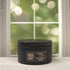 Red Ginger & Saffron 5oz Candle in Black by Moxie & Grace — a vibrant blend of ginger, saffron, lemon, amber, patchouli, and cedarwood