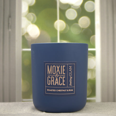 Roasted Chestnut & Rum 12oz Candle in Navy by Moxie & Grace — a warm, cozy blend of roasted chestnut, dark rum, vanilla, and smoked wood