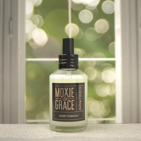 Sweet Tobacco 4oz Room Spray by Moxie & Grace — a rich, warm blend of tobacco, vanilla, honey, amber, and dark musk