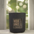 Tonka & Oud 12oz Candle in Black by Moxie & Grace — a luxurious blend of oud, tonka bean, sandalwood, amber, and dark musk