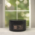 Tonka & Oud 5oz Candle in Black by Moxie & Grace — a luxurious blend of oud, tonka bean, sandalwood, amber, and dark musk