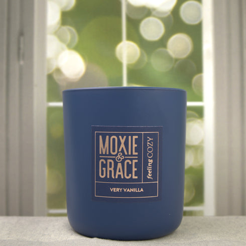 Very Vanilla 12oz Candle in Navy by Moxie & Grace — a rich, warm blend of vanilla bean, tonka, caramel, and soft musk
